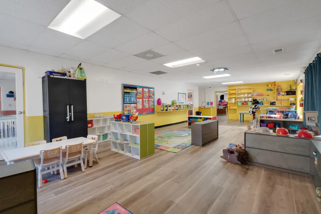 Bright, spacious classroom at Chroma Early Learning Academy featuring colorful educational materials, child-sized furniture, and organized play areas for preschool children in Marietta, GA.