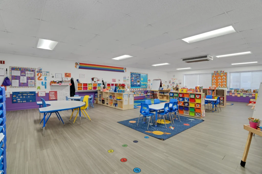 Classroom at Chroma Early Learning Academy featuring colorful learning materials, child-sized furniture, and a safe, engaging environment for preschool and childcare activities.